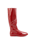 Svea Cherry Red side view of ACQUO of Sweden shiny rubber boots with a classic silhouette and flat sole.