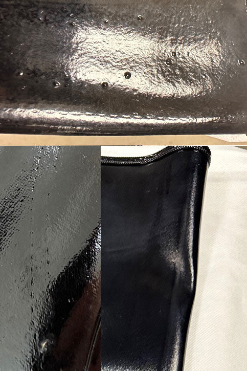 Close-up details of ACQUO of Sweden's handcrafted high-shine rubber boots, highlighting minor surface imperfections and textural variations—showcasing the artisanal nature and individuality of each pair in the brand's luxury boot collection