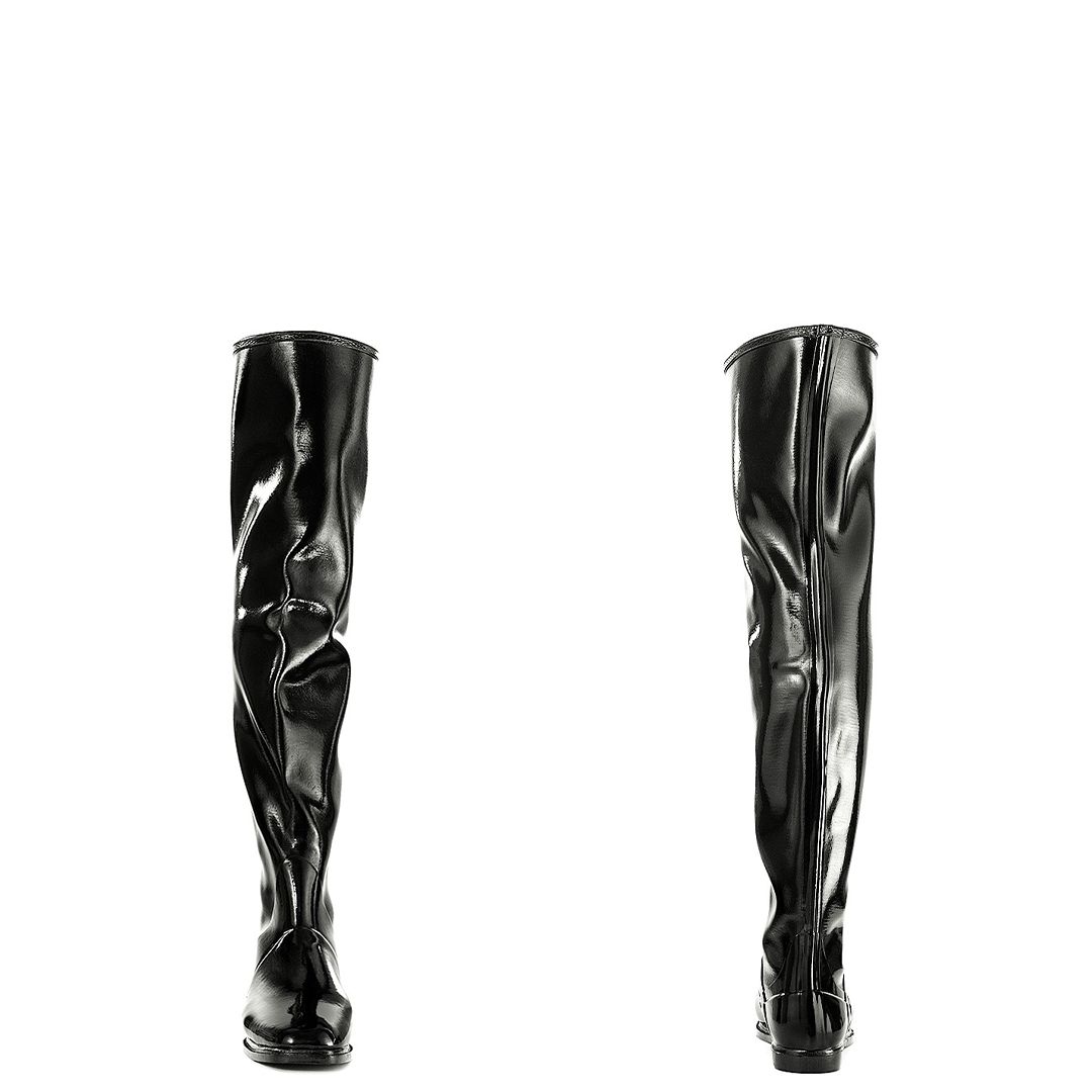 Front and back views of ACQUO of Sweden's signature over the knee black boots in high-shine natural rubber, featuring a sleek, sculpted silhouette with flat sole for timeless elegance and comfort