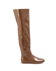 Greta Walnut Brown side view of ACQUO of Sweden shiny rubber boots with a sleek silhouette and flat sole.