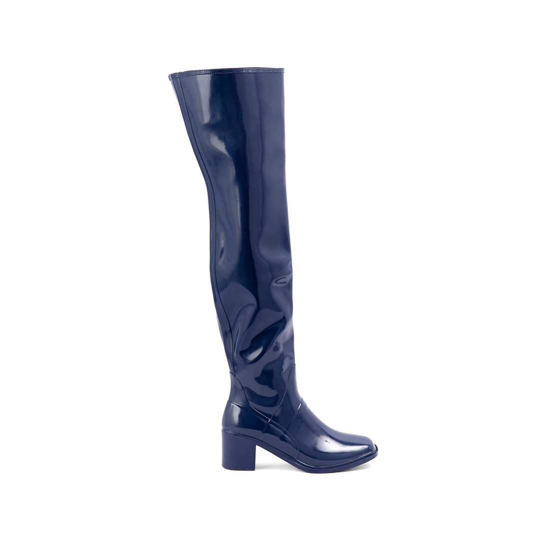 Lisa Iris Blue side view by ACQUO of Sweden featuring elegant iris blue over-the-knee rubber boots with a sleek silhouette and refined block heel.