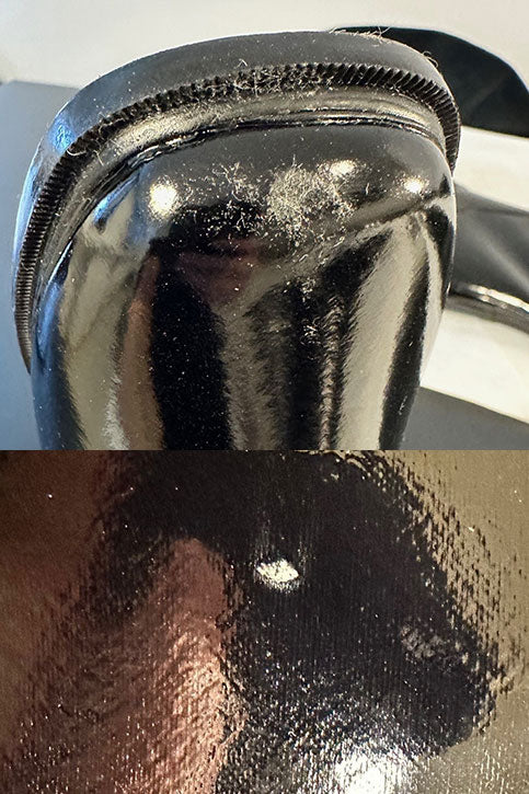Close-up of ACQUO of Sweden’s black glossy rubber boots highlighting minor surface imperfections and wear on the toe and shaft, demonstrating the natural texture and usage characteristics of premium handcrafted high-shine boots