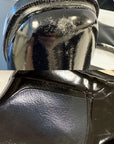 Close-up detail of ACQUO of Sweden over-the-knee black rubber boots, highlighting natural surface variations and craftsmanship quality—ideal for customers seeking authentic, stylish footwear with a high-shine finish and premium durability
