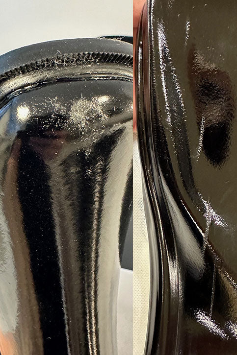 Close-up of ACQUO of Sweden black rubber boots showing surface defects, scratches, and imperfections