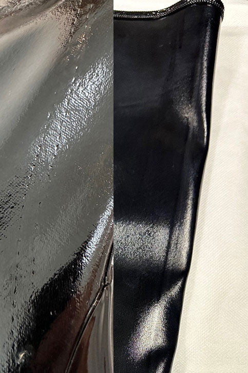 Close-up of ACQUO of Sweden black rubber boot surface with visible dents, scratches, and irregular texture imperfections