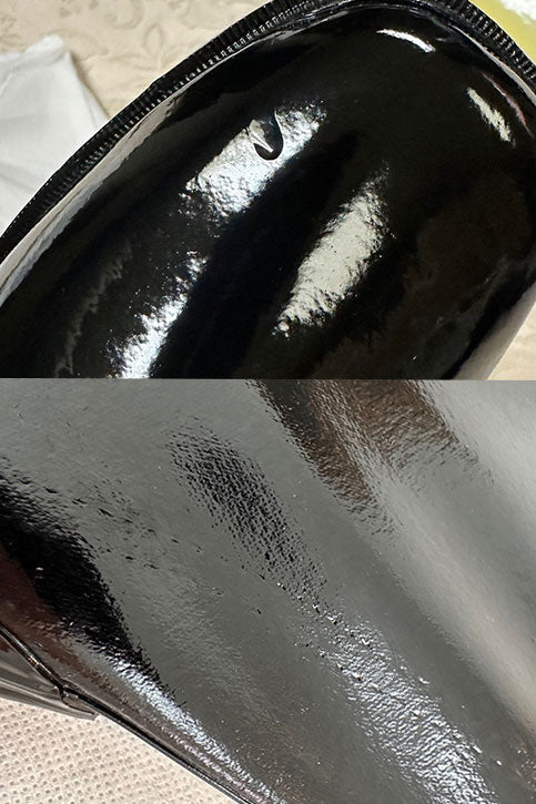 Detail shot of ACQUO of Sweden’s glossy black over the knee boots, featuring a visible surface dent on the toe and subtle texture irregularities on the shaft — exemplifying the artisanal rubber craftsmanship behind every pair