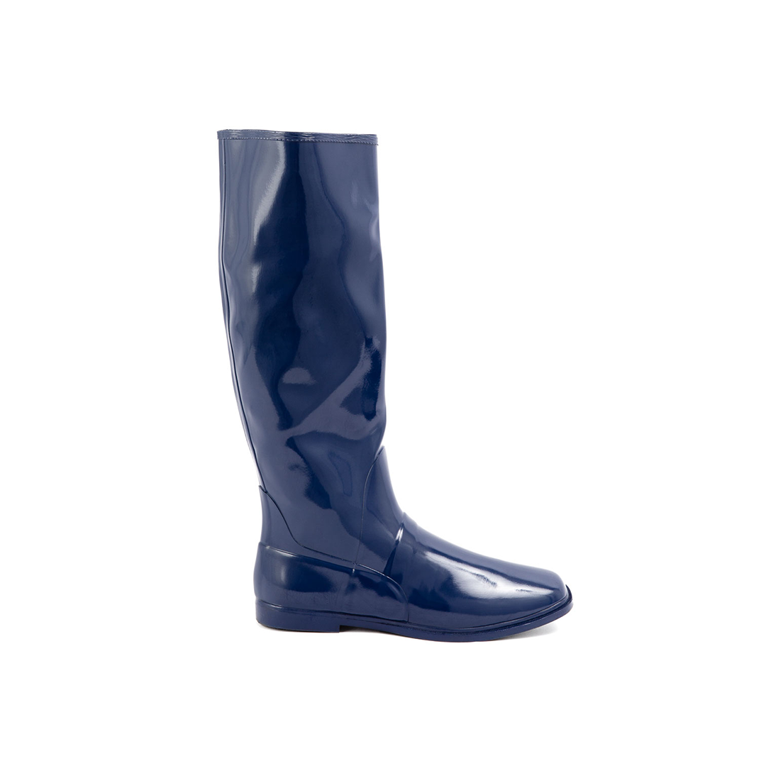 Svea Iris Blue side view by ACQUO of Sweden featuring elegant iris blue knee-high rubber boots with a sleek silhouette and flat sole
