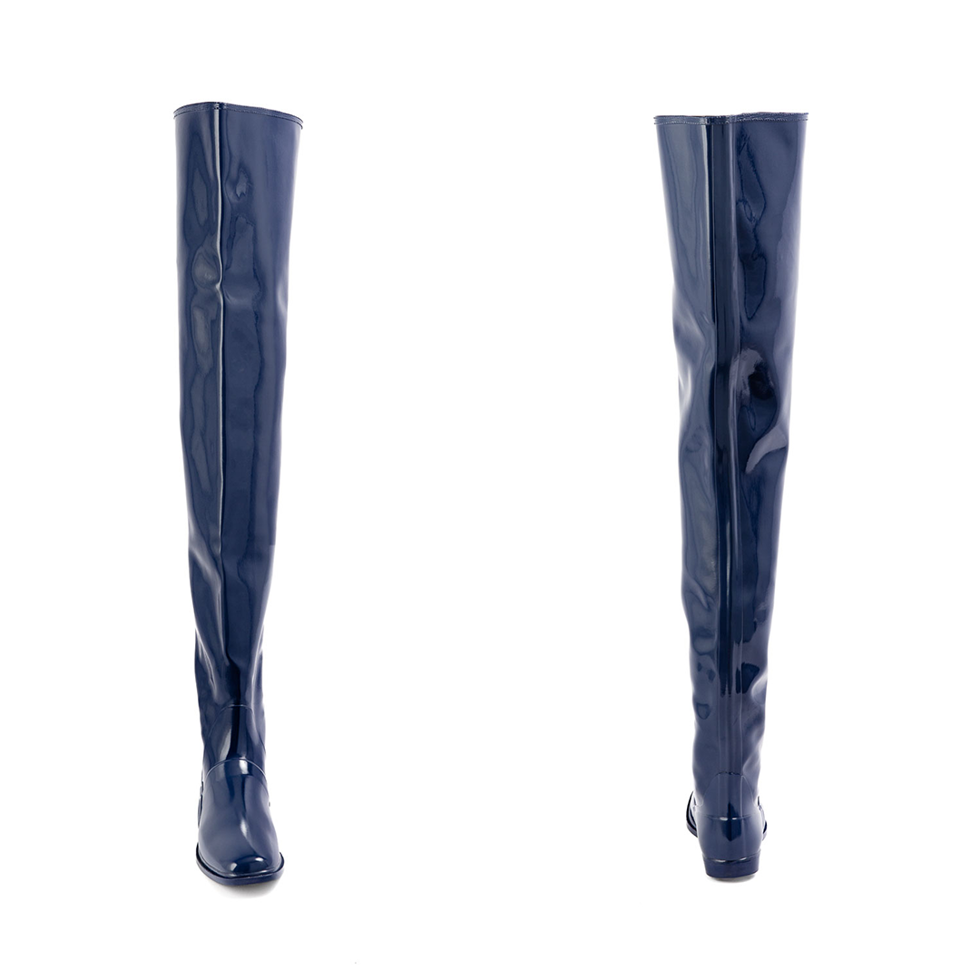 Vega Iris Blue front and back view by ACQUO of Sweden featuring elegant iris blue over-the-knee rubber boots with a sleek silhouette and refined flat heel.