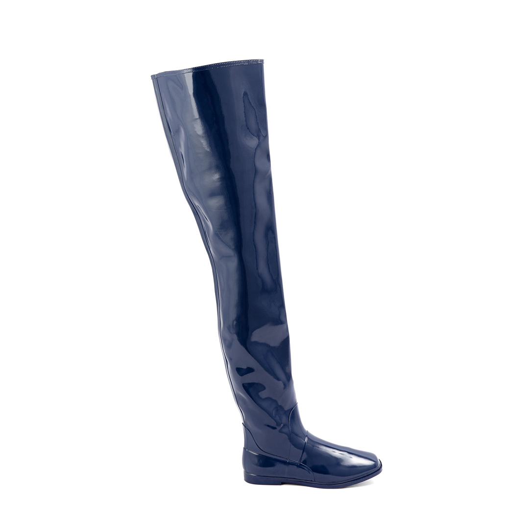 Vega Iris Blue side view by ACQUO of Sweden featuring elegant iris blue over-the-knee rubber boots with a sleek silhouette and refined flat heel.